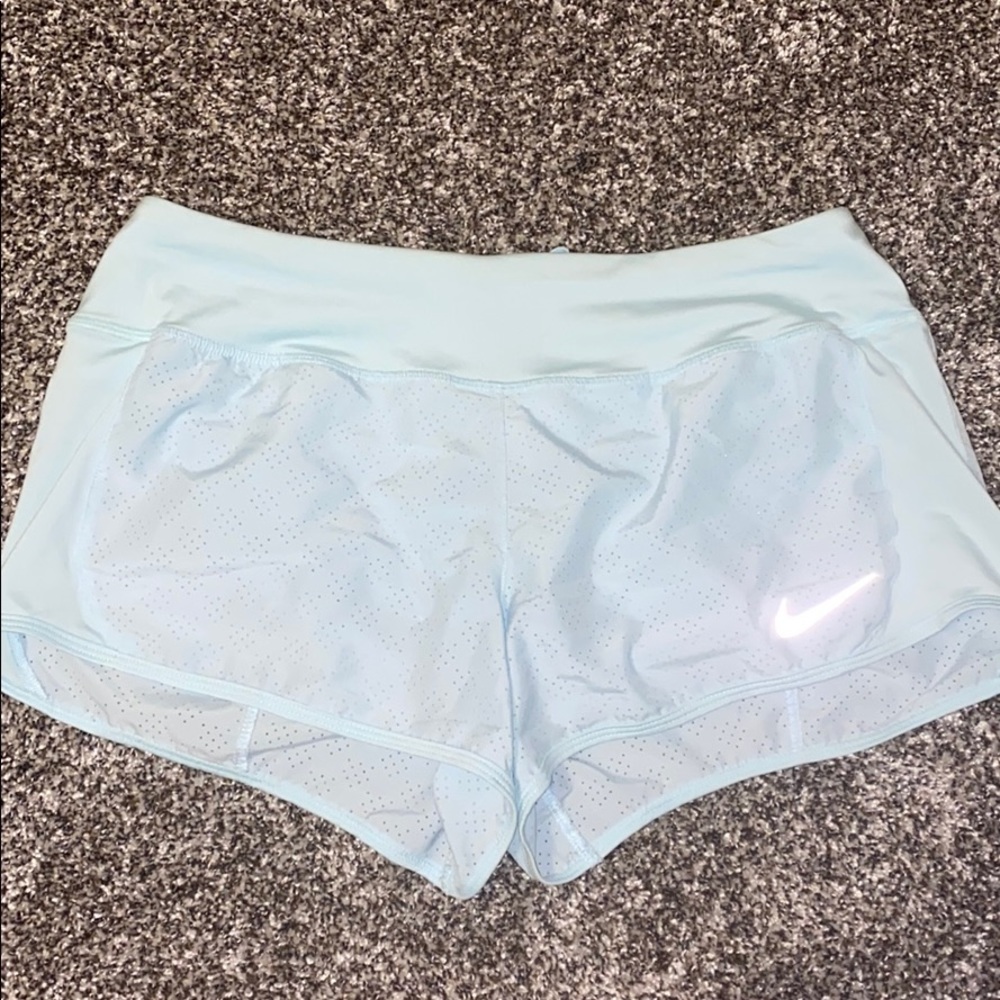 Small light blue Nike shorts